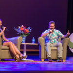 Zeke Smith from the Survivor being interviewed on stage by female at Algonquin Commons Theatre