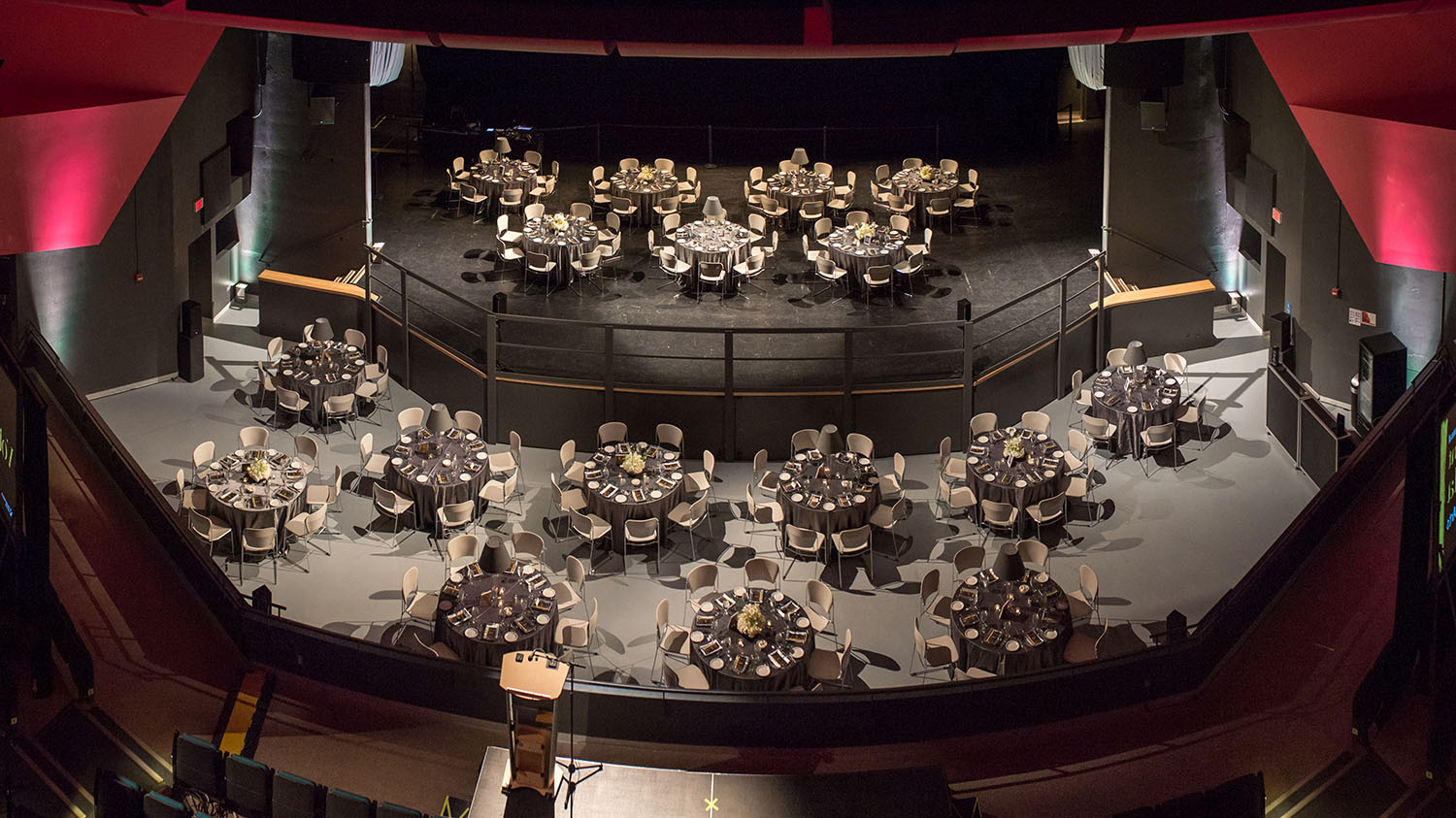 Gala layout, with tables and chairs onstage and on the Floor Level. Podium is on the Main Level.